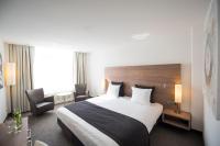 Ein Bett oder Betten in einem Zimmer der Unterkunft Sanadome Hotel & Spa Nijmegen