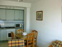 Kuchyňa alebo kuchynka v ubytovaní Apartamentos Zafiro Unitursa