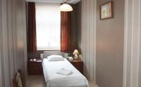 Posteľ alebo postele v izbe v ubytovaní Hotel Nad Rzeczką