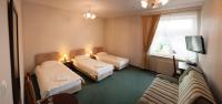 Posteľ alebo postele v izbe v ubytovaní Hotel Nad Rzeczką