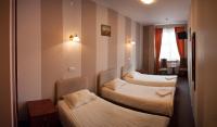 Posteľ alebo postele v izbe v ubytovaní Hotel Nad Rzeczką