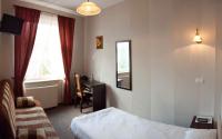 Posteľ alebo postele v izbe v ubytovaní Hotel Nad Rzeczką