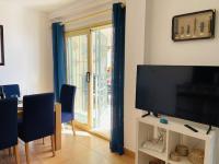 Telewizja i/lub zestaw kina domowego w obiekcie Apartamento Tamango Hill