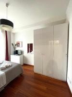 Posteľ alebo postele v izbe v ubytovaní Lucens Domus Appartamento Roma quartiere Trieste - vicino Metro b1 -