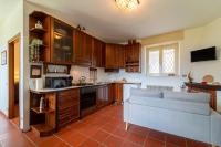 A kitchen or kitchenette at Swan Lake by Wonderful Italy