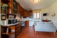 A kitchen or kitchenette at Swan Lake by Wonderful Italy
