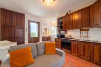 A kitchen or kitchenette at Swan Lake by Wonderful Italy