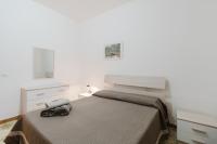 Posteľ alebo postele v izbe v ubytovaní Casa Adriana