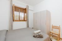 Posteľ alebo postele v izbe v ubytovaní Casa Adriana