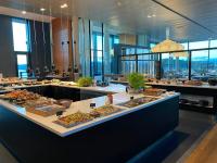 a buffet line with many different types of food at Kragerø Resort in Kragerø