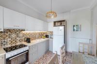 Kuchyňa alebo kuchynka v ubytovaní Poseidonia Syros cozy house
