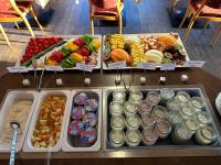 a buffet of different types of food on a table at Der Burgfellnerhof - Adults Only in Schladming