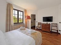 A bed or beds in a room at Golf Club Margara
