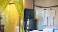 Big Tree Guesthouse - Naxi old styleにあるベッド