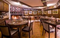 Reštaurácia alebo iné gastronomické zariadenie v ubytovaní Hotel Pilier D'Angle & Wellness