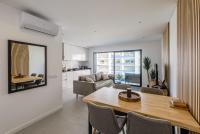 Posezení v ubytování Modern condo Praia da Rocha,Terracos Da Ciudade