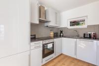 A kitchen or kitchenette at Vacation Home in Prater - Central, Garden and Sauna