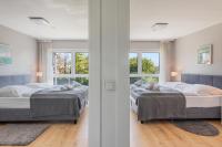 A bed or beds in a room at Vacation Home in Prater - Central, Garden and Sauna