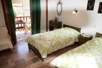 Łóżko lub łóżka w pokoju w obiekcie Mirto Apartments