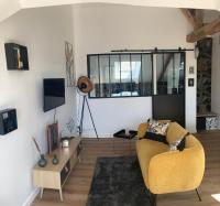 Telewizja i/lub zestaw kina domowego w obiekcie Gîte La Terrasse du 37