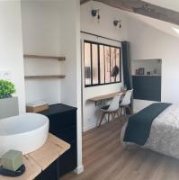 Łóżko lub łóżka w pokoju w obiekcie Gîte La Terrasse du 37