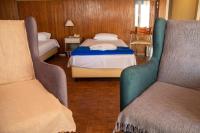 Posteľ alebo postele v izbe v ubytovaní Hôtel Argo