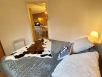 Posteľ alebo postele v izbe v ubytovaní Appartement confortable Flumet - Piscine, Parking, 2 ch, 6 pers - FR-1-603-69