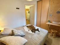 Posteľ alebo postele v izbe v ubytovaní Appartement confortable Flumet - Piscine, Parking, 2 ch, 6 pers - FR-1-603-69