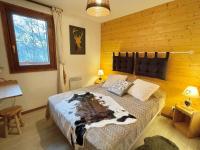 Posteľ alebo postele v izbe v ubytovaní Appartement confortable Flumet - Piscine, Parking, 2 ch, 6 pers - FR-1-603-69