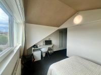 Postel nebo postele na pokoji v ubytování Grand Petit Hotel ex Shato Gesson