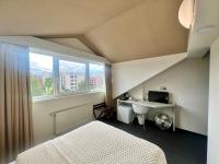 Postel nebo postele na pokoji v ubytování Grand Petit Hotel ex Shato Gesson