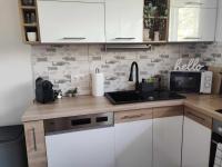 Kuchyňa alebo kuchynka v ubytovaní Centrum Apartman Kőszeg