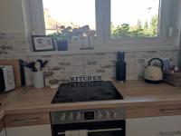 Kuchyňa alebo kuchynka v ubytovaní Centrum Apartman Kőszeg