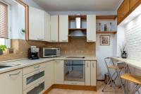 Kuchyň nebo kuchyňský kout v ubytování Tsarevets panoramic apartments Veliko Tarnovo