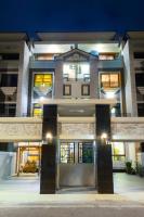 a large building with the front door lit up at night at Ediman Bed &amp; Breakfast in Hualien City