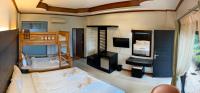 Blue Carina Hotel Phuketにあるベッド