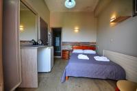 Posteľ alebo postele v izbe v ubytovaní Bikakis Family Apartments