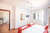 Postel nebo postele na pokoji v ubytování Hotel Apartamentos Villa Gomera
