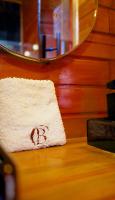 a rug with a drawing on it sitting on a table at Chalé Boutique Spa- Sauna seca, Jacuzzi , Rede suspensa in Campos do Jordão