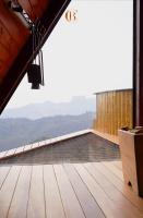 a view from the top of the roof of a building at Chalé Boutique Spa- Sauna seca, Jacuzzi , Rede suspensa in Campos do Jordão