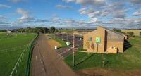 a renderización de un edificio en un campo en Holiday Inn Huntingdon Racecourse by IHG, en Huntingdon