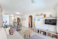 TV a/nebo společenská místnost v ubytování Sol Playa Paraiso