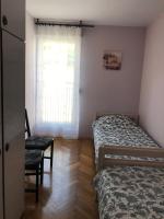 Postel nebo postele na pokoji v ubytování Apartment Mila
