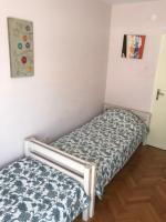 Postel nebo postele na pokoji v ubytování Apartment Mila