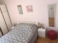 Postel nebo postele na pokoji v ubytování Apartment Mila