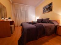 Postel nebo postele na pokoji v ubytování Apartments Kraljic