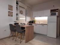 Kuchyň nebo kuchyňský kout v ubytování Apartments Kraljic