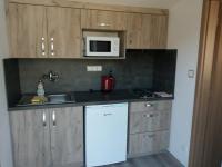 Kuchyň nebo kuchyňský kout v ubytování Apartmán Vyhlídka