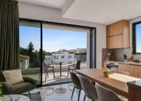 Kuchyň nebo kuchyňský kout v ubytování Olive Shared Pool Apartments