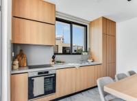 Kuchyň nebo kuchyňský kout v ubytování Olive Shared Pool Apartments